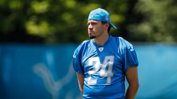 Detroit Lions place kicker John Parker Romo (24) watches practice during OTAs at Detroit Lions headquarters in Allen Park on Thursday, June 1, 2023.